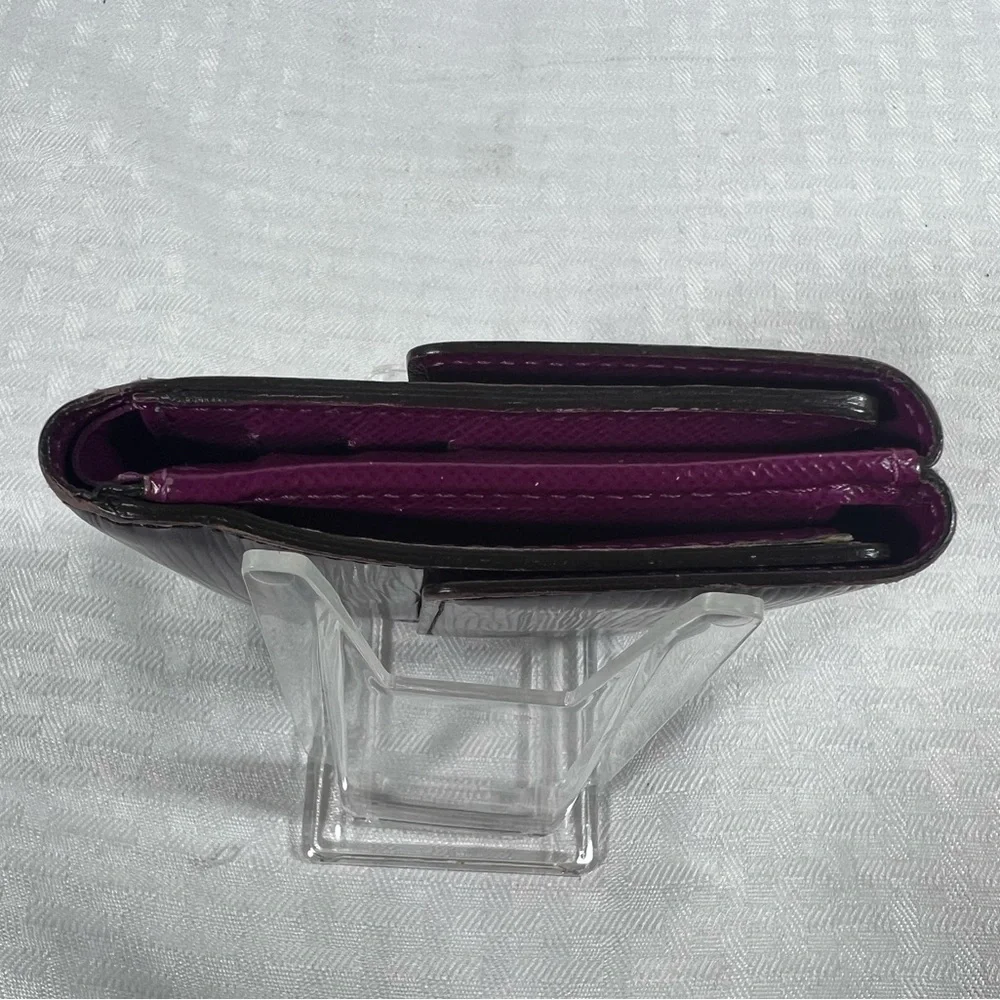 1136: Louis Vuitton Epi Leather Trifold Wallet Purple